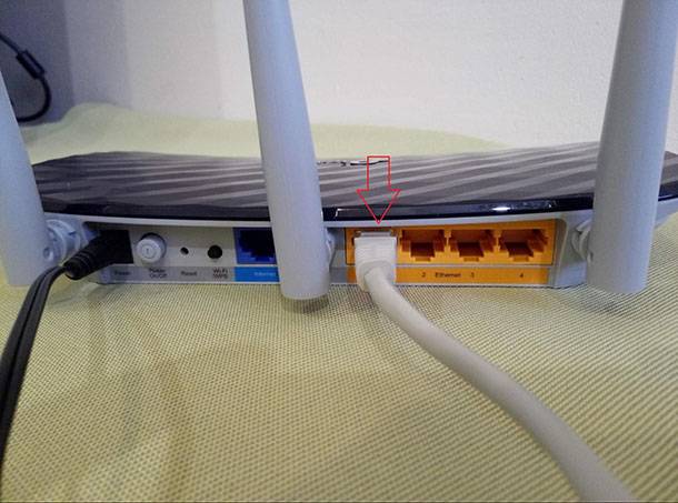 Use a network cable to connect LAN ports of the main router with the additional (secondary) router. 