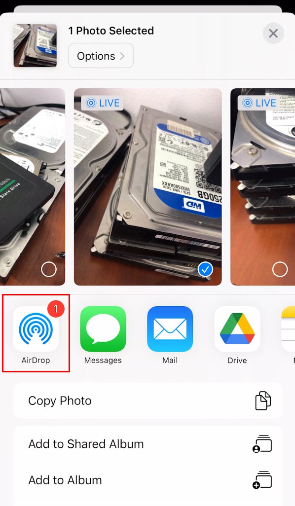 iPhone: seleccione AirDrop no menu Partilhar