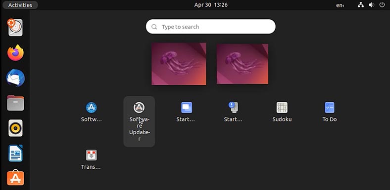 Linux: Abra o menu Mostrar aplicações e execute o Software Updater